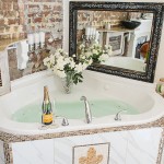 Jacuzzi tub filled with water in the Fleur De Lis Suite.