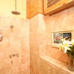 Multi shower heads inside the shower of the Fleur De Lis Suite.