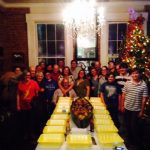 Group photo around the table before they eat crawfish