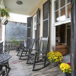 Black rocking chairs on the balcony of the Royal Suite.