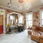 Leather sectional sofa and a pub table in the Royal Suite.